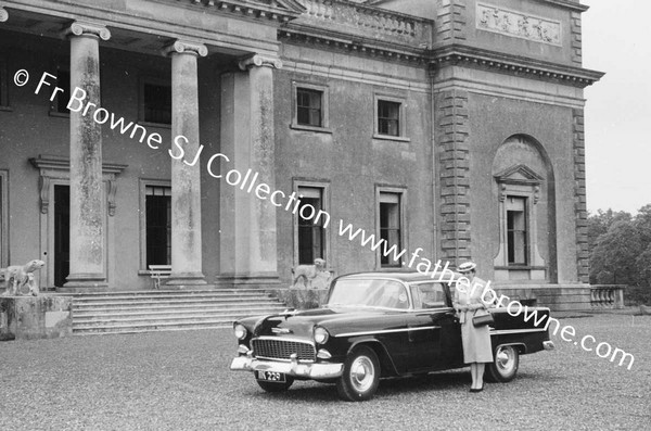EMO COURT   FRONT OF HOUSE  LADY WITH CAR
